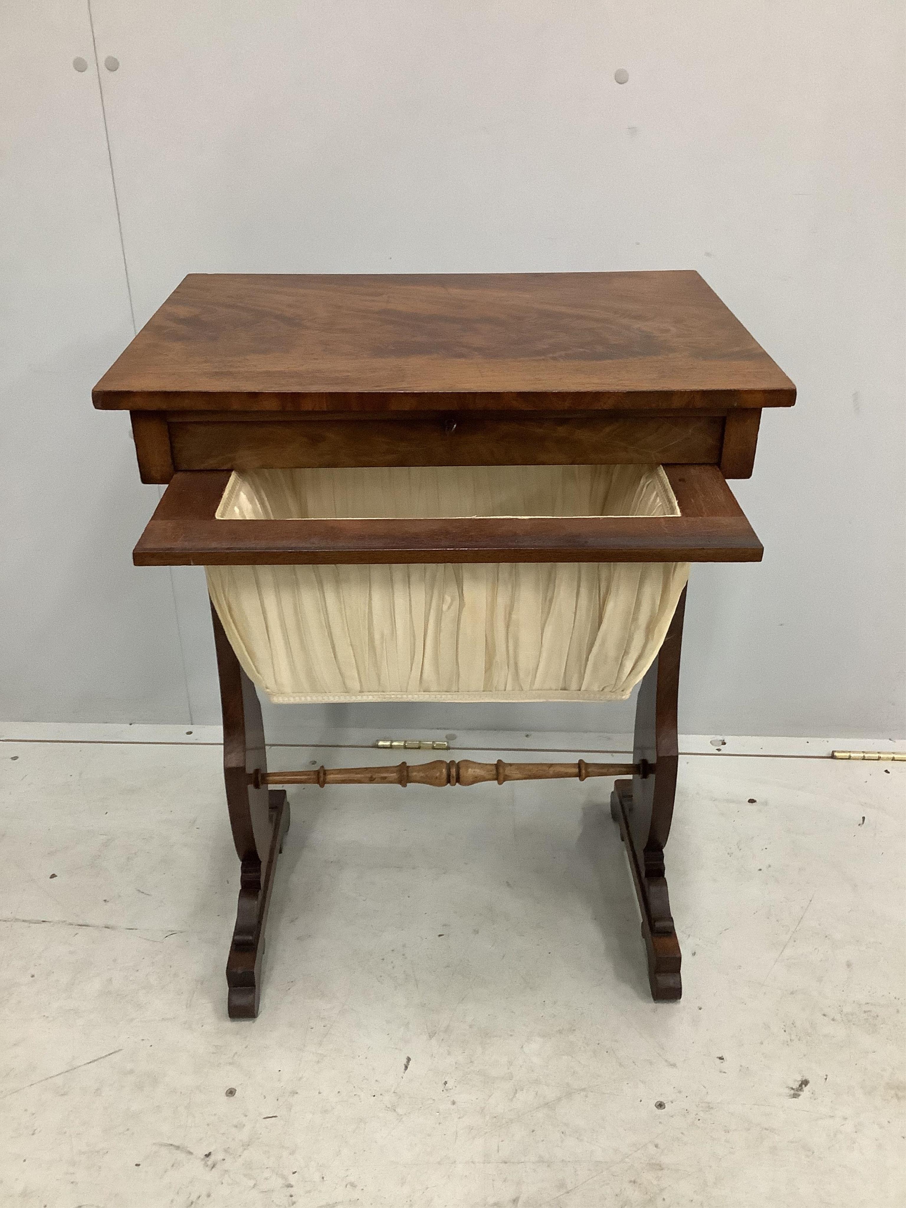 An early Victorian mahogany work table, width 54cm, height 72cm. Condition - good but for rubbing to the stretcher